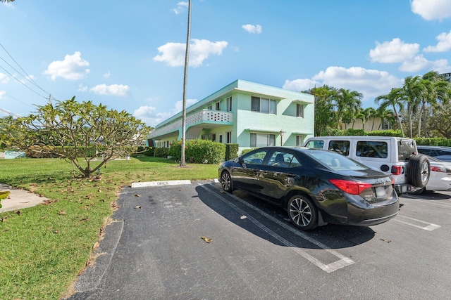 1006 Casuarina Rd Unit 11, Delray Beach, FL 33483 - view of uncovered parking lot