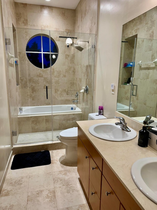 full bathroom with combined bath / shower with glass door, vanity, and toilet