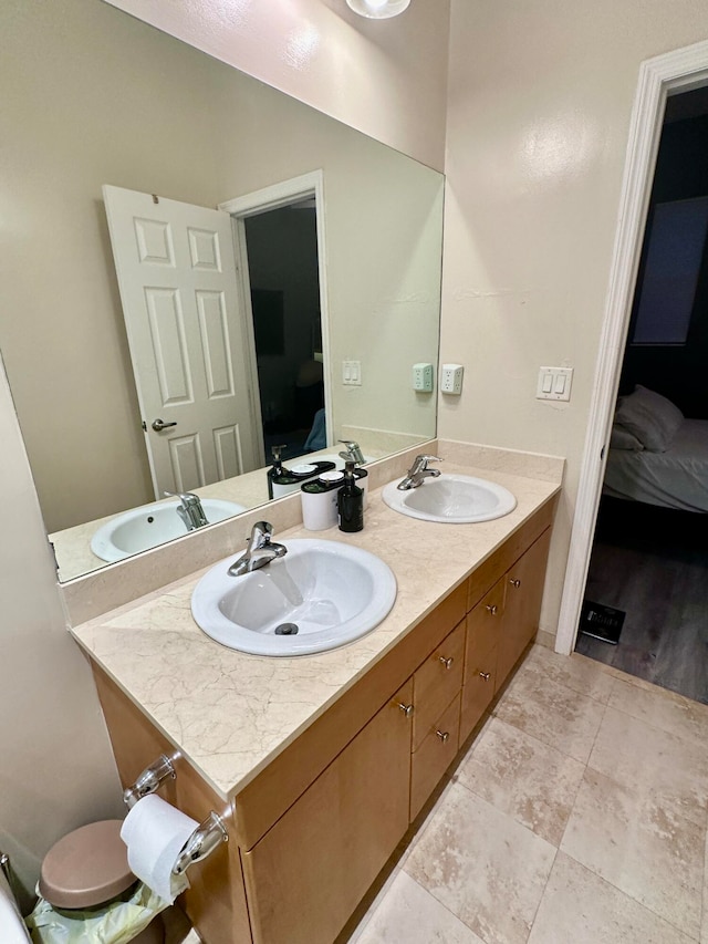 bathroom featuring hardwood / wood-style floors and vanity