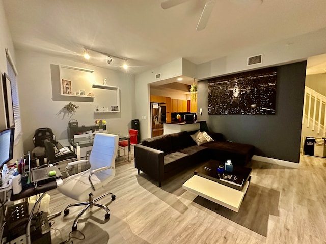 living room with wood-type flooring