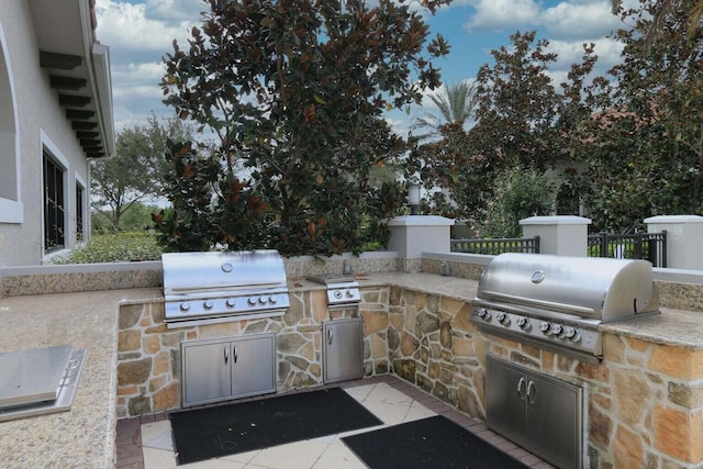 view of patio / terrace featuring grilling area and exterior kitchen