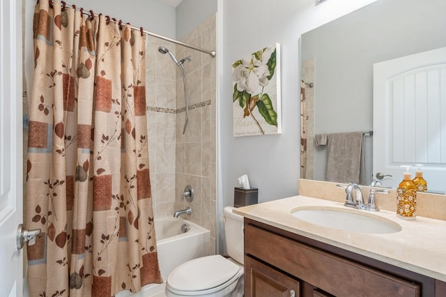 full bathroom featuring toilet, shower / tub combo, and vanity