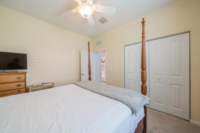 carpeted bedroom with a closet and ceiling fan