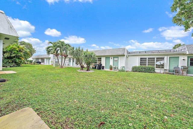 exterior space with a front yard