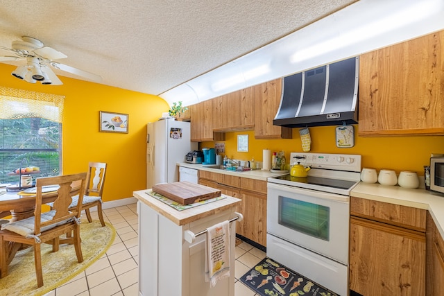 kitchen with white appliances, ventilation hood, a textured ceiling, a sink, and light tile patterned flooring