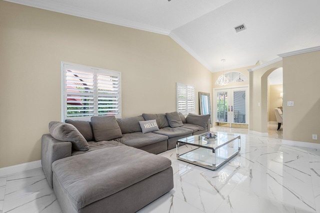 living room featuring a wealth of natural light, high vaulted ceiling, crown molding, and french doors