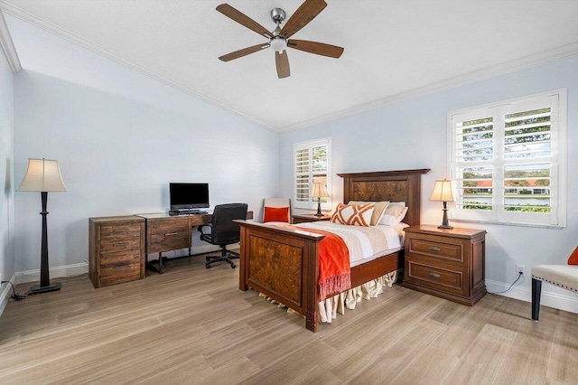 bedroom with light hardwood / wood-style floors, ceiling fan, and crown molding