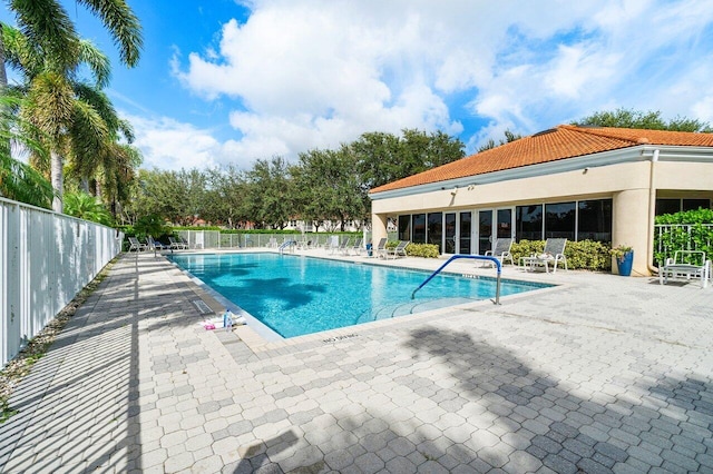 view of pool featuring a patio