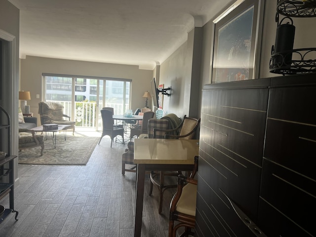 dining area with hardwood / wood-style floors