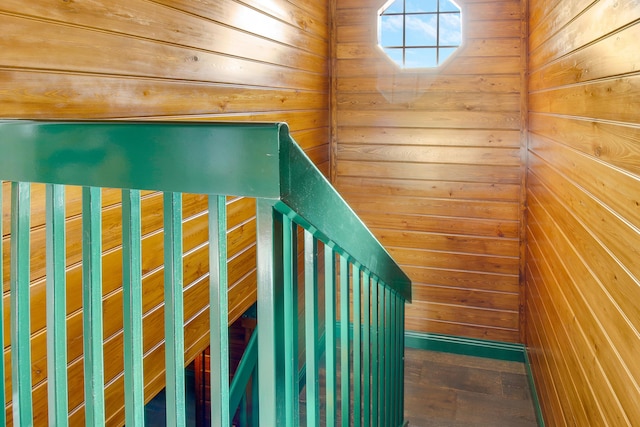 stairs with wood walls