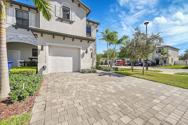 view of front of home with a garage