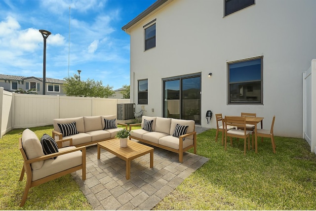 20357 NW 4th Path, Miami Gardens, FL 33169 - rear view of house featuring an outdoor hangout area, stucco siding, a patio, and central AC