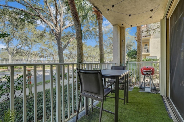 balcony featuring area for grilling