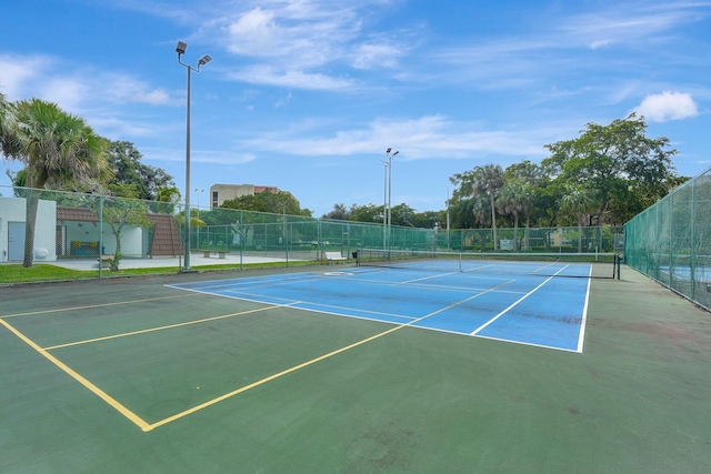 view of tennis court with basketball court