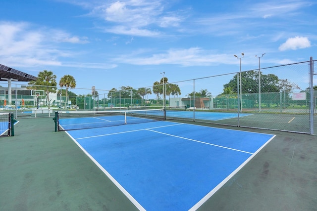 view of tennis court with basketball court