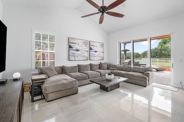 living room featuring high vaulted ceiling and ceiling fan