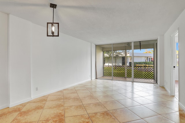 unfurnished dining area featuring light tile patterned floors