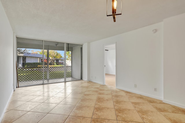 view of tiled spare room