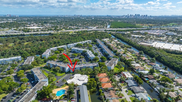 birds eye view of property featuring a water view