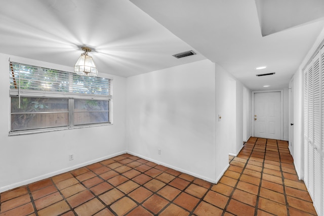 view of tiled spare room