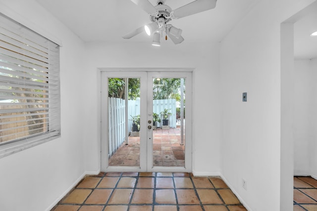 doorway with ceiling fan and french doors