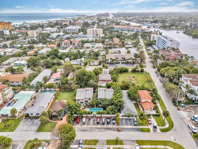 birds eye view of property featuring a water view