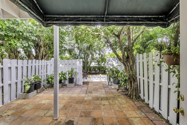 1912 NE 6th St, Deerfield Beach, FL 33441 - view of patio / terrace with a fenced backyard