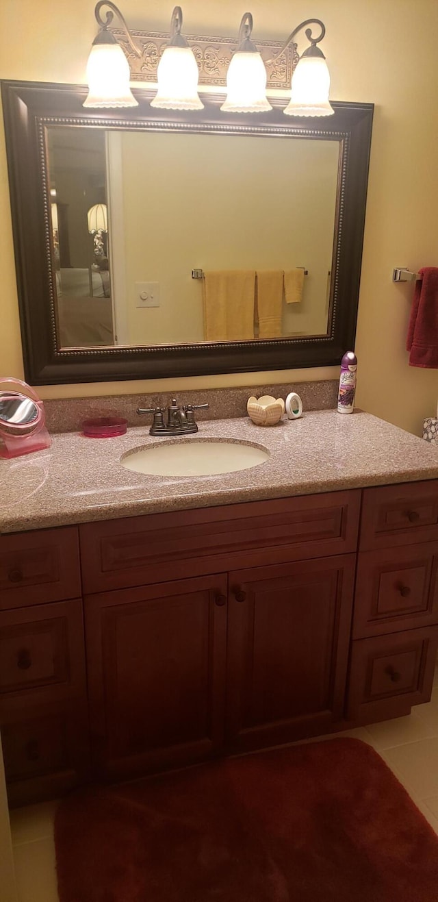 bathroom with vanity and tile patterned floors