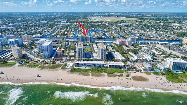 aerial view with a beach view and a water view