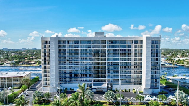 view of building exterior with a water view