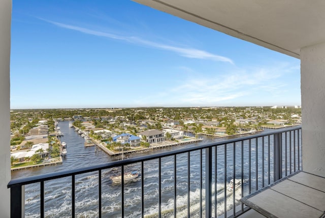 balcony featuring a water view