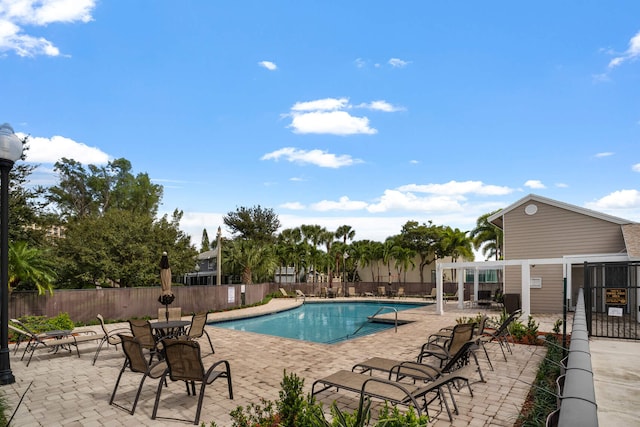 view of pool featuring a patio