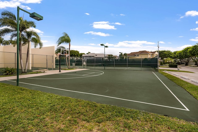 view of basketball court featuring tennis court