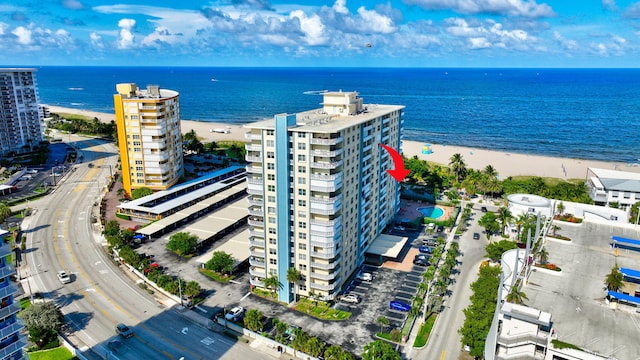 aerial view with a view of the beach and a water view