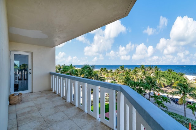 balcony featuring a water view