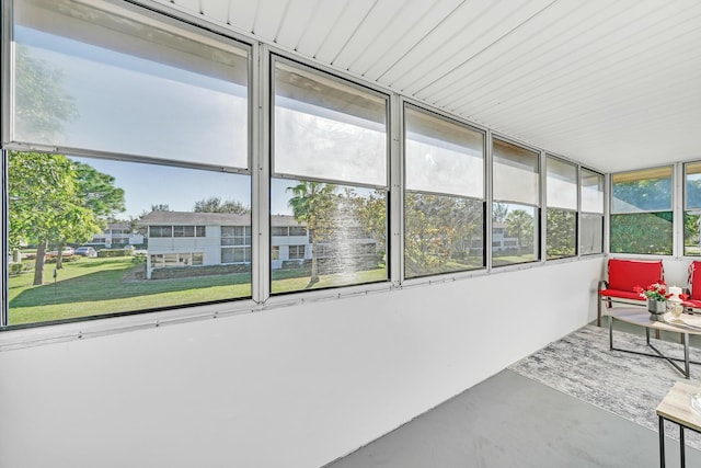 unfurnished sunroom with plenty of natural light