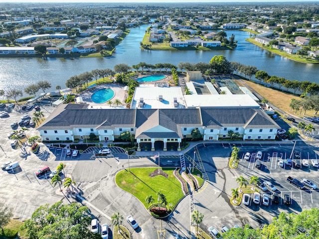 bird's eye view with a water view