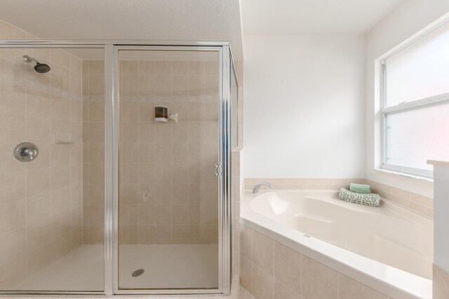 308 SW Egret Lndg, Port Saint Lucie, FL 34953 - full bathroom with a shower stall and a bath