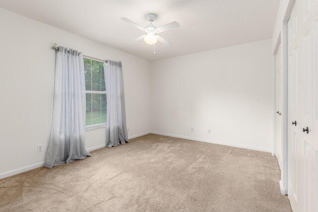 308 SW Egret Lndg, Port Saint Lucie, FL 34953 - carpeted spare room featuring ceiling fan and baseboards