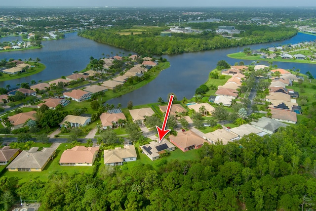 bird's eye view with a water view