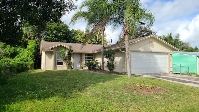 ranch-style house with a front lawn and a garage