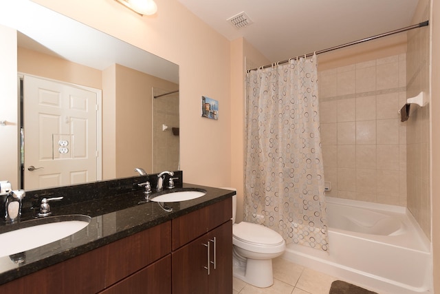 full bathroom featuring shower / bath combo, tile patterned flooring, vanity, and toilet