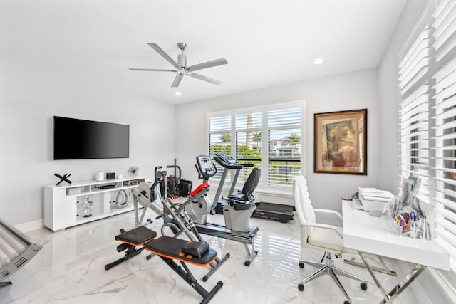 workout room featuring ceiling fan