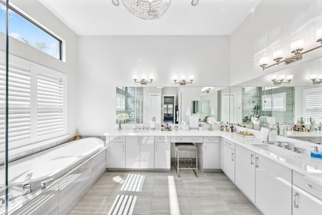 bathroom featuring vanity, tile patterned floors, and independent shower and bath