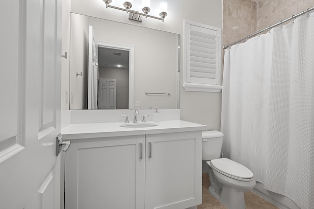 bathroom featuring vanity, a shower with curtain, and toilet