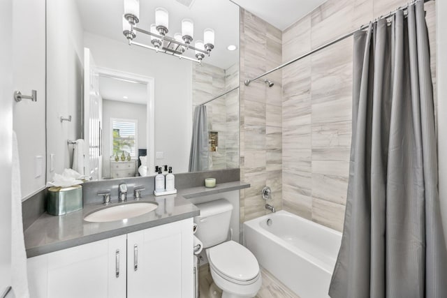 full bathroom with toilet, vanity, and shower / bath combo with shower curtain