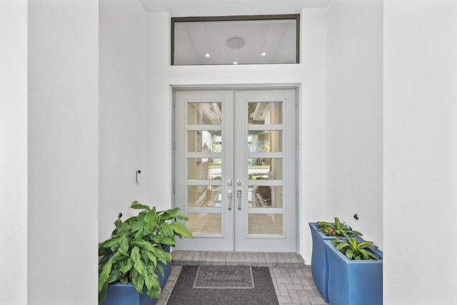 view of exterior entry featuring french doors