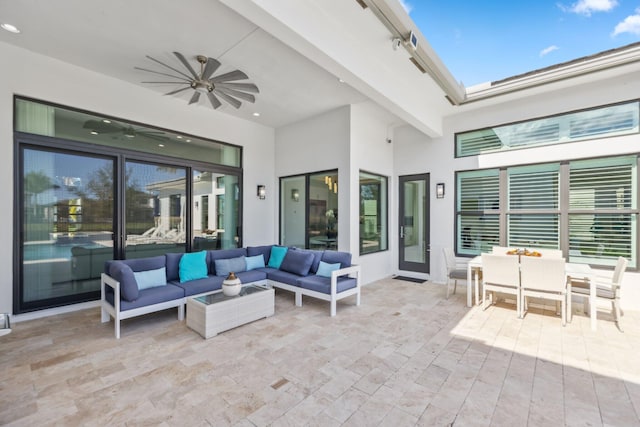 view of patio with ceiling fan and an outdoor hangout area