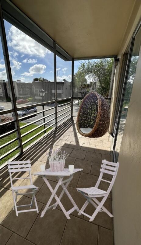 view of patio / terrace with a balcony