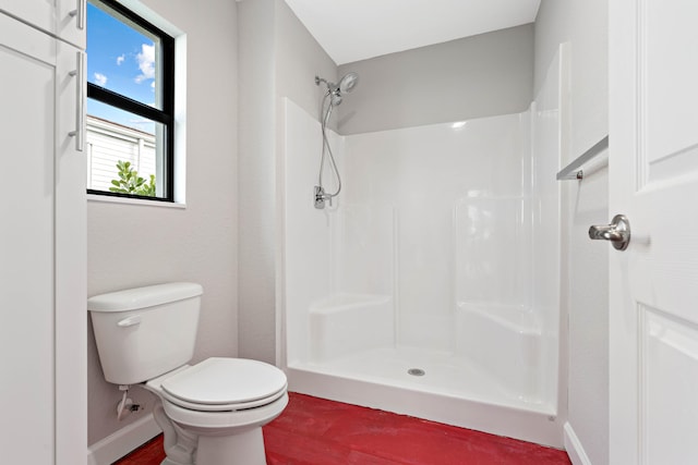 15093 Aguila Ave, Fort Pierce, FL 34951 - bathroom with walk in shower, toilet, and hardwood / wood-style flooring